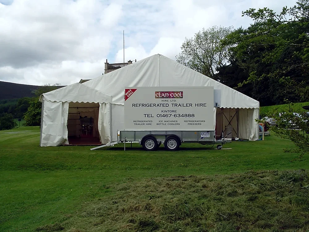 Clancool refrigerated trailer parked beside a marquee
